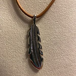 Lauren Ralph Lauren Jewelry - Silvertone feather pendant leather necklace LRL Lauren Ralph Lauren Jewelry - Silvertone feather pendant leather necklace LRL